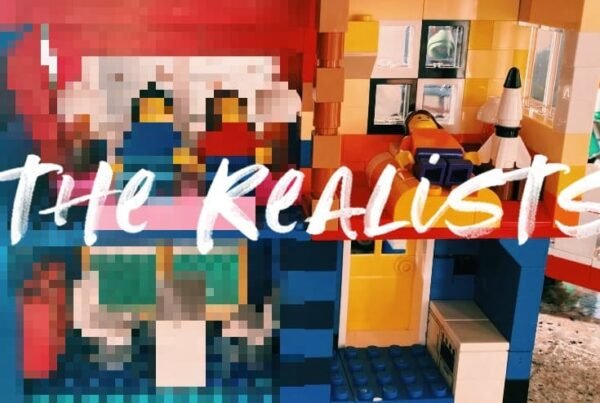 a photo of a LEGO house that is blurry on the left side, in focus on the right side, with the title on top THE REALISTS