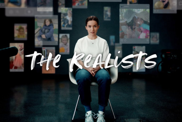 a still image from the T Mobile PSA "Share with Care" with the title The Realists on top